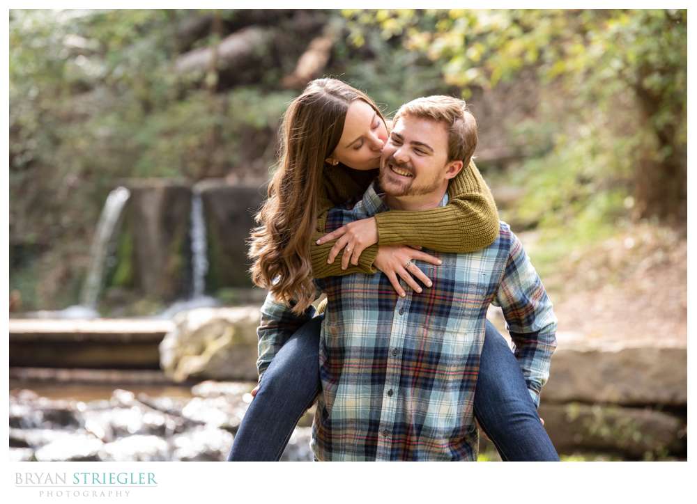 piggy back ride in engagement photos